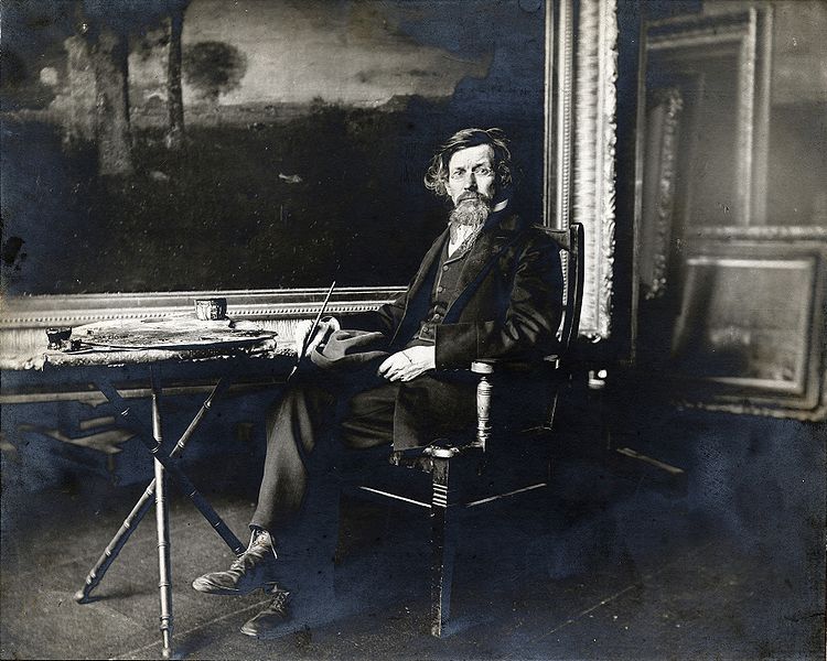 George Inness in his studio